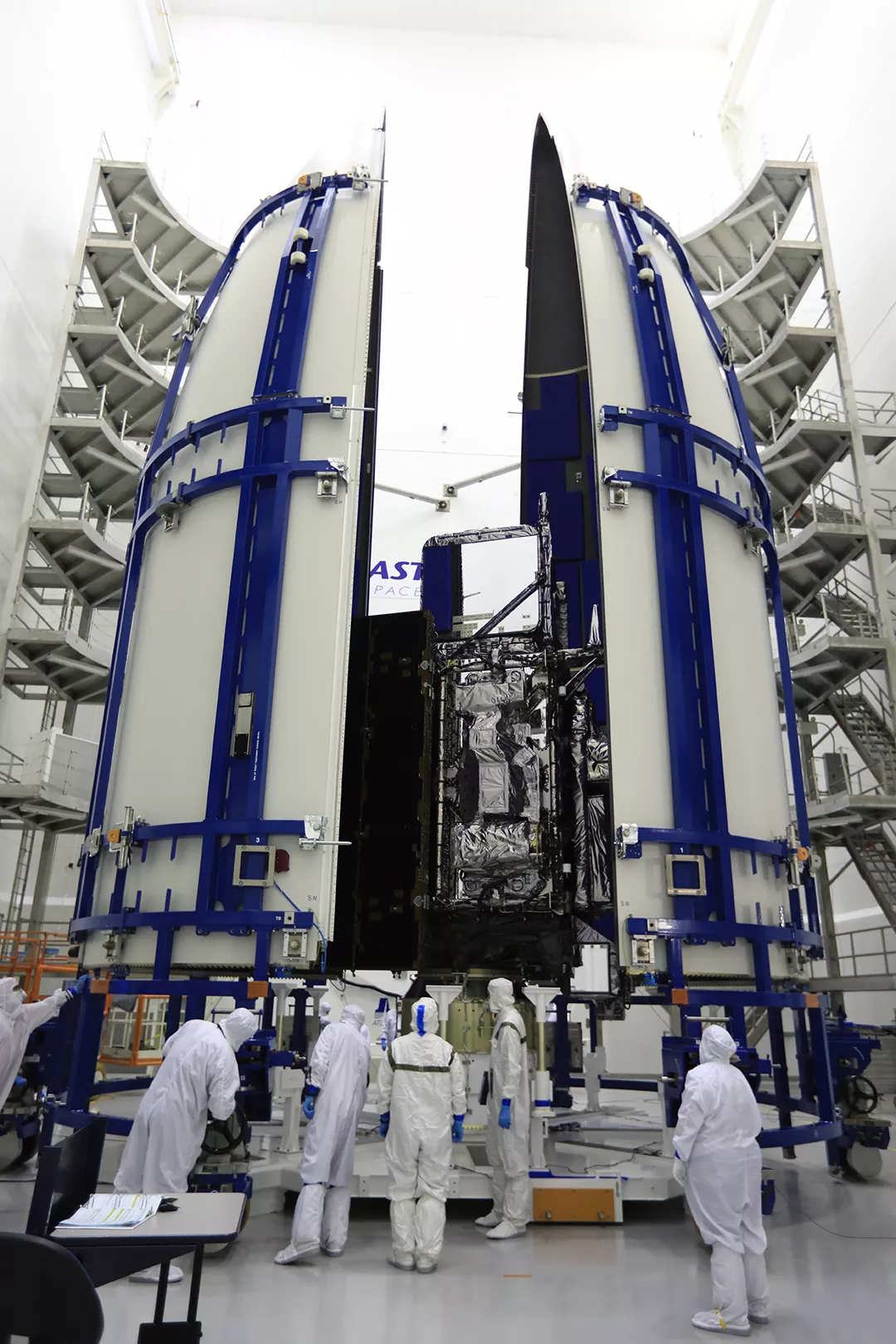 Encapsulating the GOES-R satellite in its payload fairing.