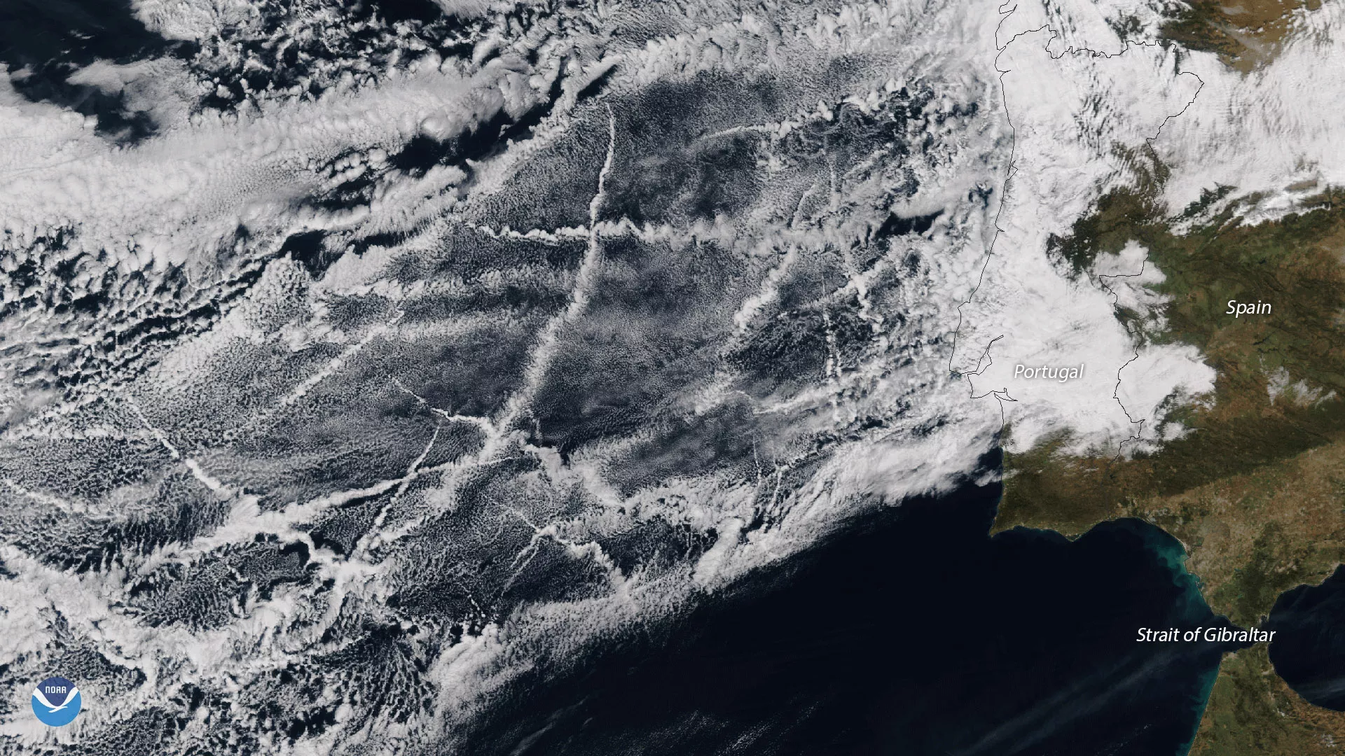 The ship tracks in this image stretch several hundred miles off the coast of Portugal, and occur in one of the most heavily trafficked areas for cargo ships in the world.