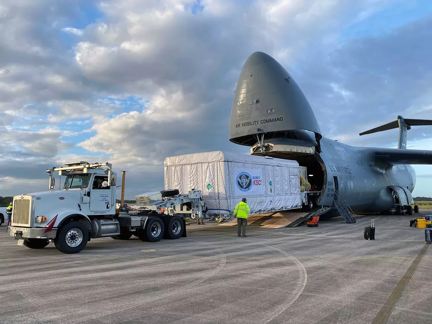 Image of a plane and GOES-T