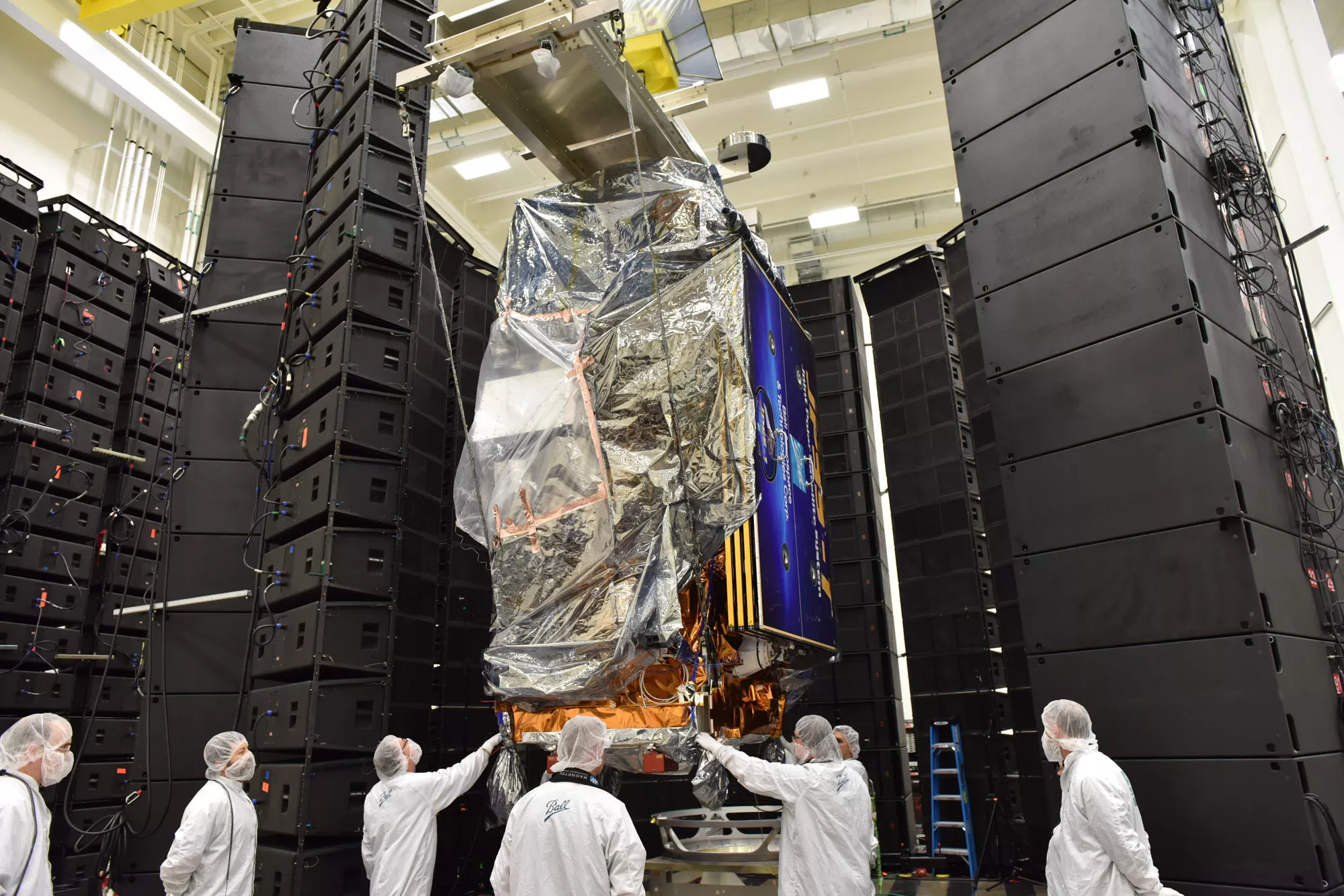 Image of JPSS-1 in acoustic testing chamber