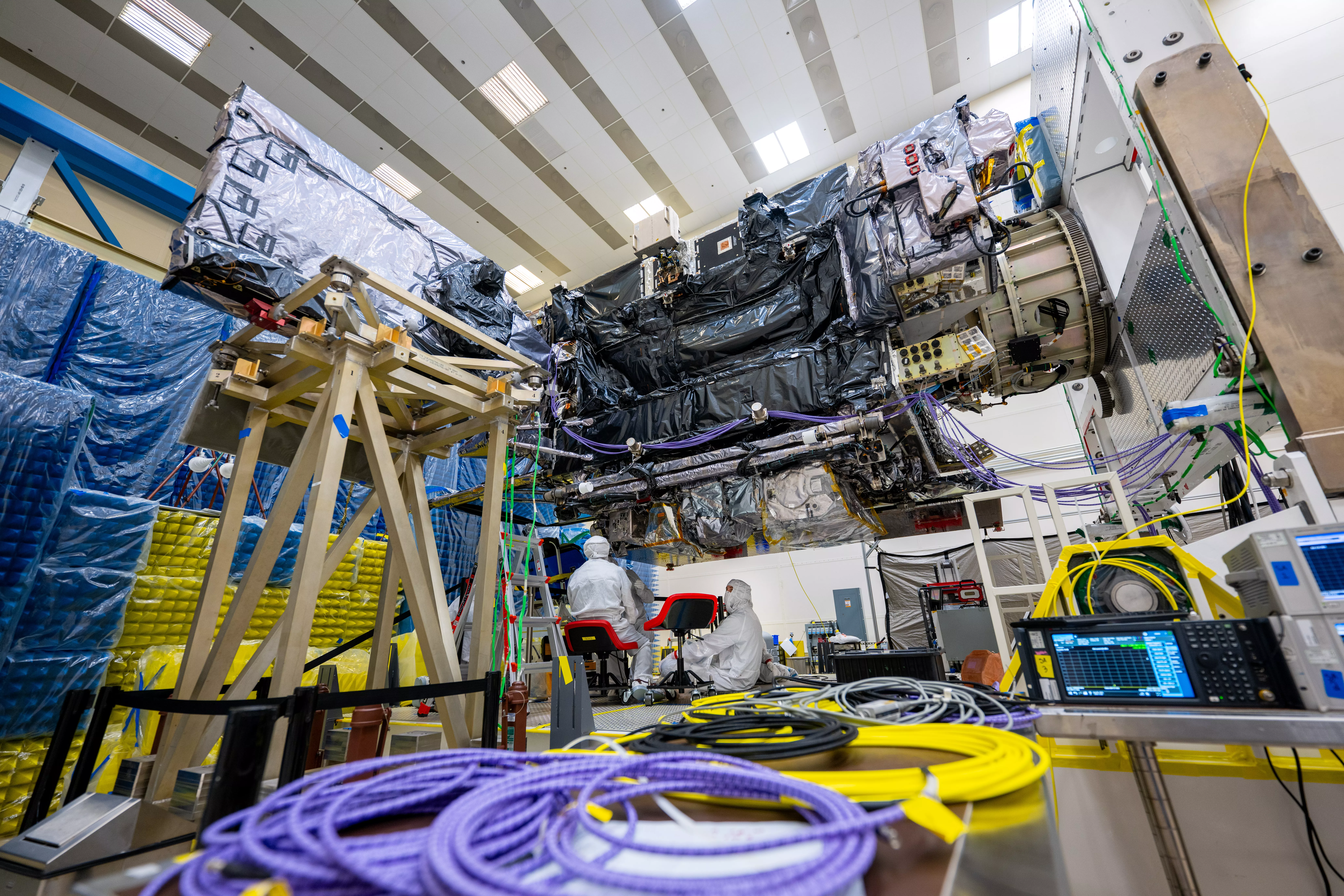 Image of Engineers preparing GOES-U for EMI/EMC testing. 