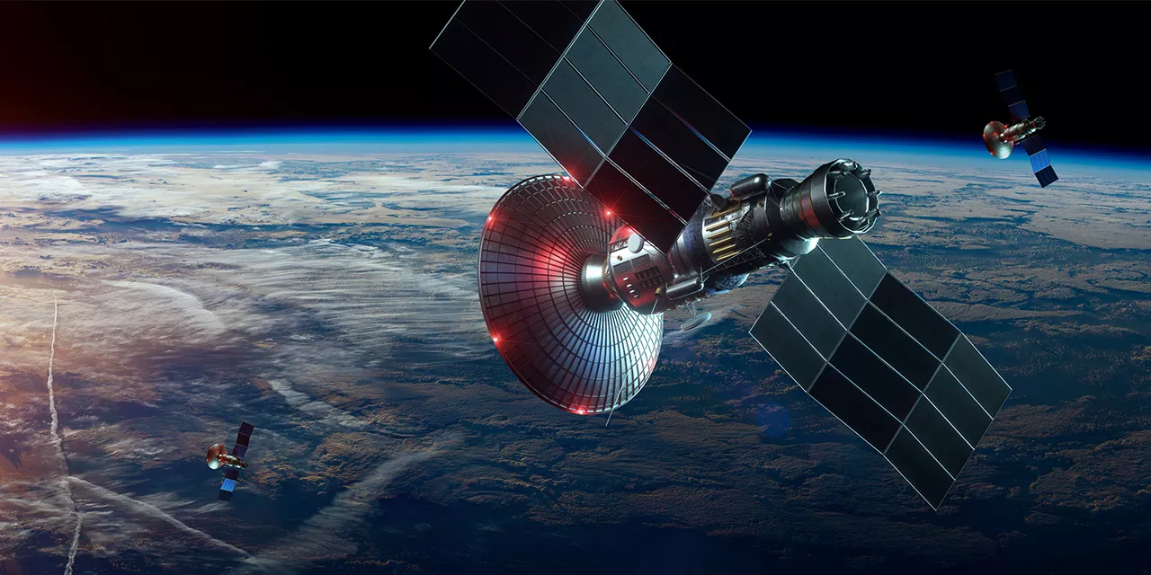 Image of a satellite circling the earth.