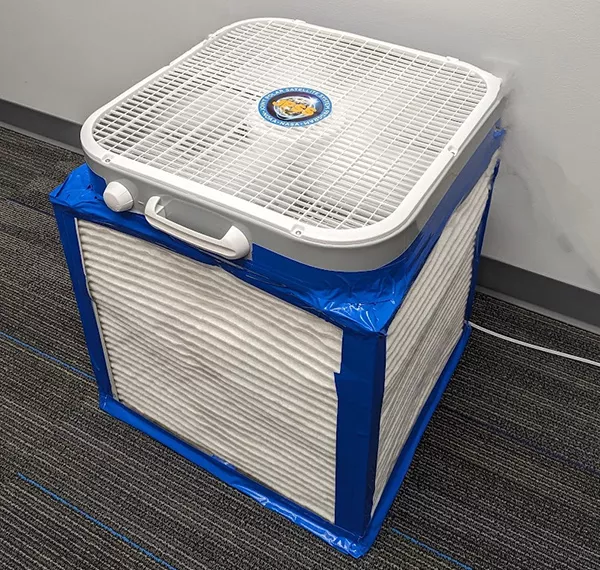 Photo of a finished assembly of a Corsi-Rosenthal air filter box.