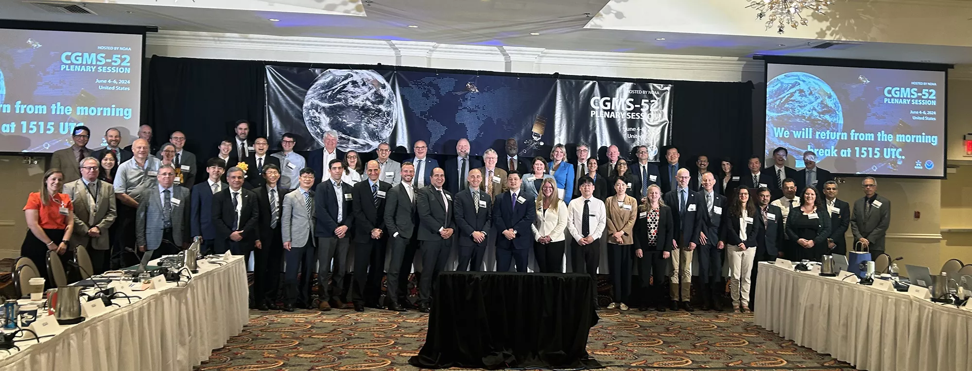 Group photo of participants at the 52nd Plenary Meeting of the Coordination Group for Meteorological Satellites (CGMS-52)