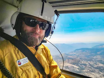 Zach Tolby observed terrain and fire activity during a helicopter flight over the Caldor Fire in California as it moved into the Lake Tahoe Basin.