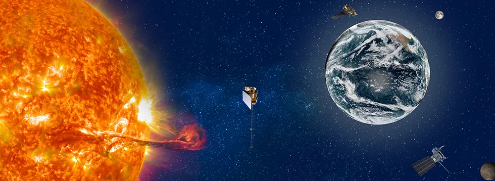 The sun and earth with satellites in orbit.