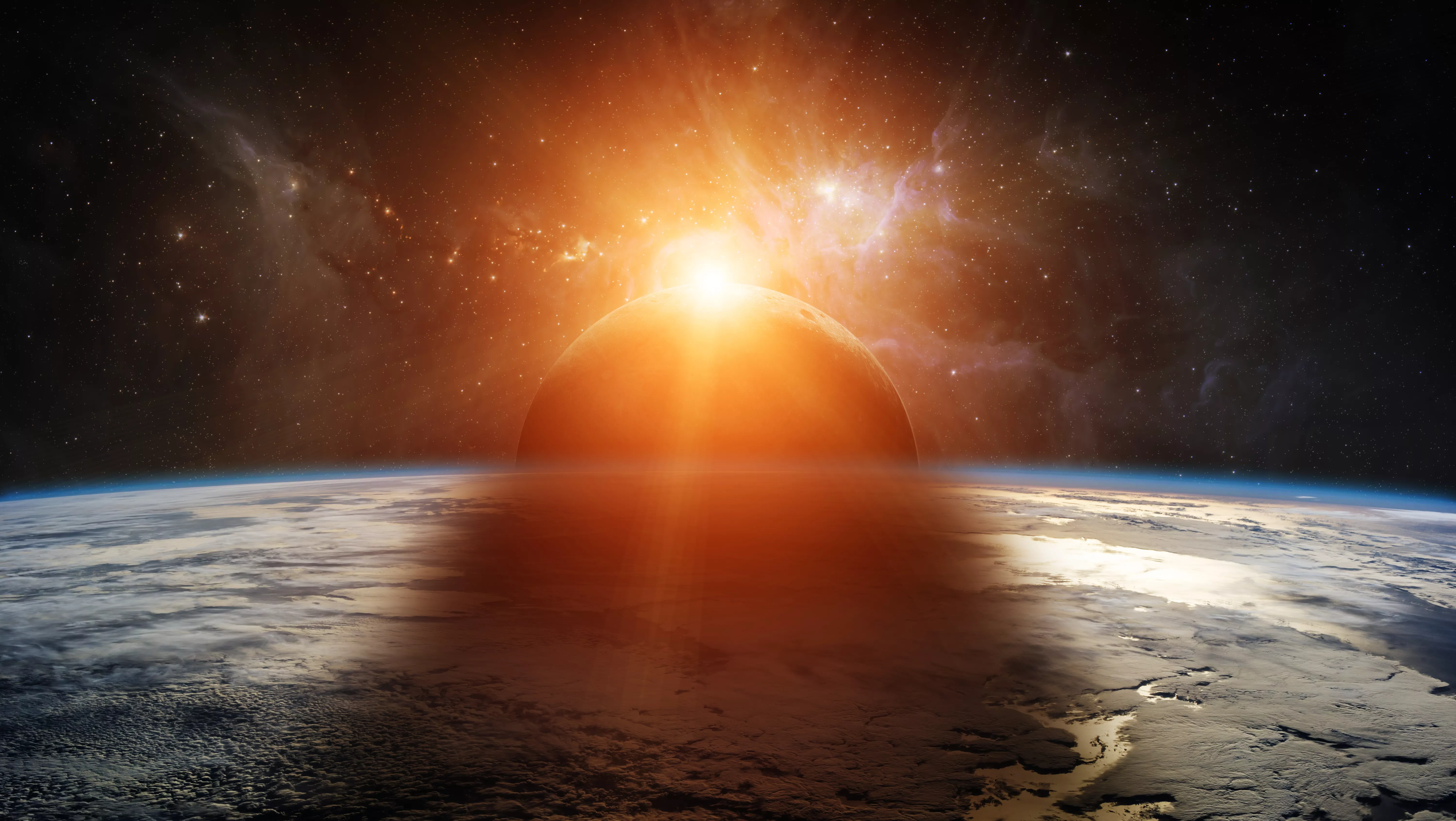 The sun seen with the earth in the foreground.