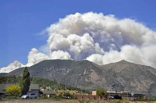 Smoke plume over a mountain in Arizona.