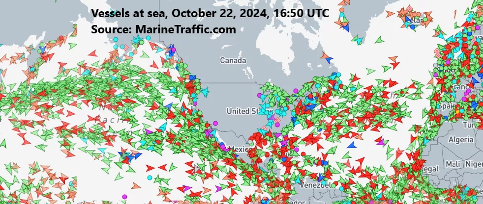 Map showing global vessel traffic on October 22, 2024, with colored arrows indicating ship locations and routes. Data source: MarineTraffic.com.