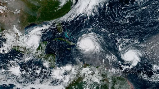 Two hurricanes over the atlantic ocean seen from space.