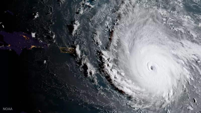 Satellite imagery of the swirling clouds and defined eye of Hurricane Irma approaching the Leeward Islands