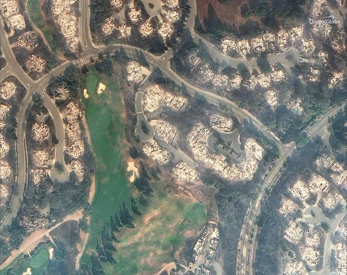 A very high resolution satellite image of northern California shows the aftermath of 2017 fires, down to individual homes
